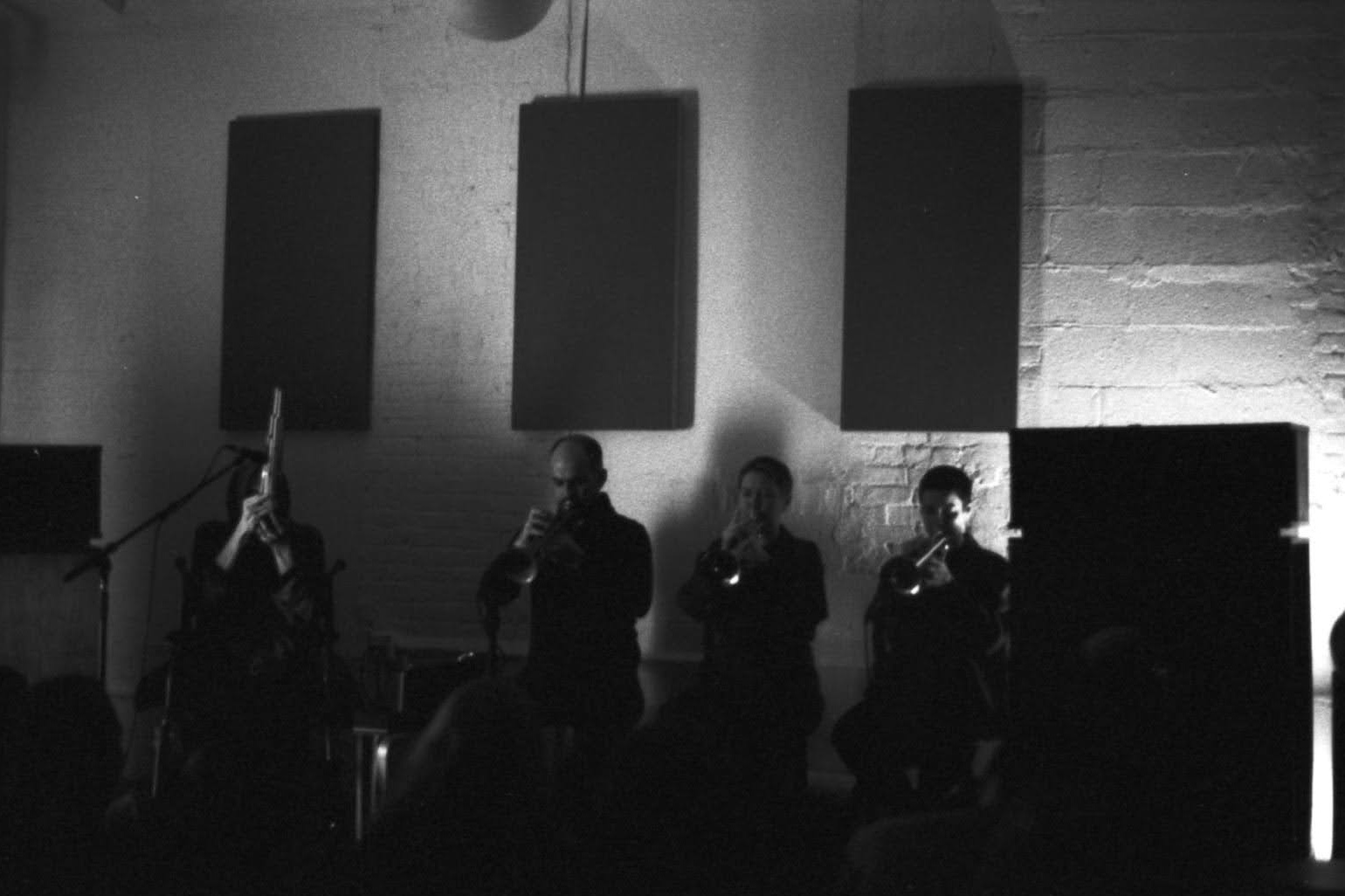 The Kamigaku Ensemble—Catherine Christer Hennix on shō; Amir ElSaffar, Ellen Arkbro, and Susana Santos Silva on trumpet; and Marcus Pal (not pictured) on electronics—perform at Blank Forms in November 2022. Photos: Austin Larkin.