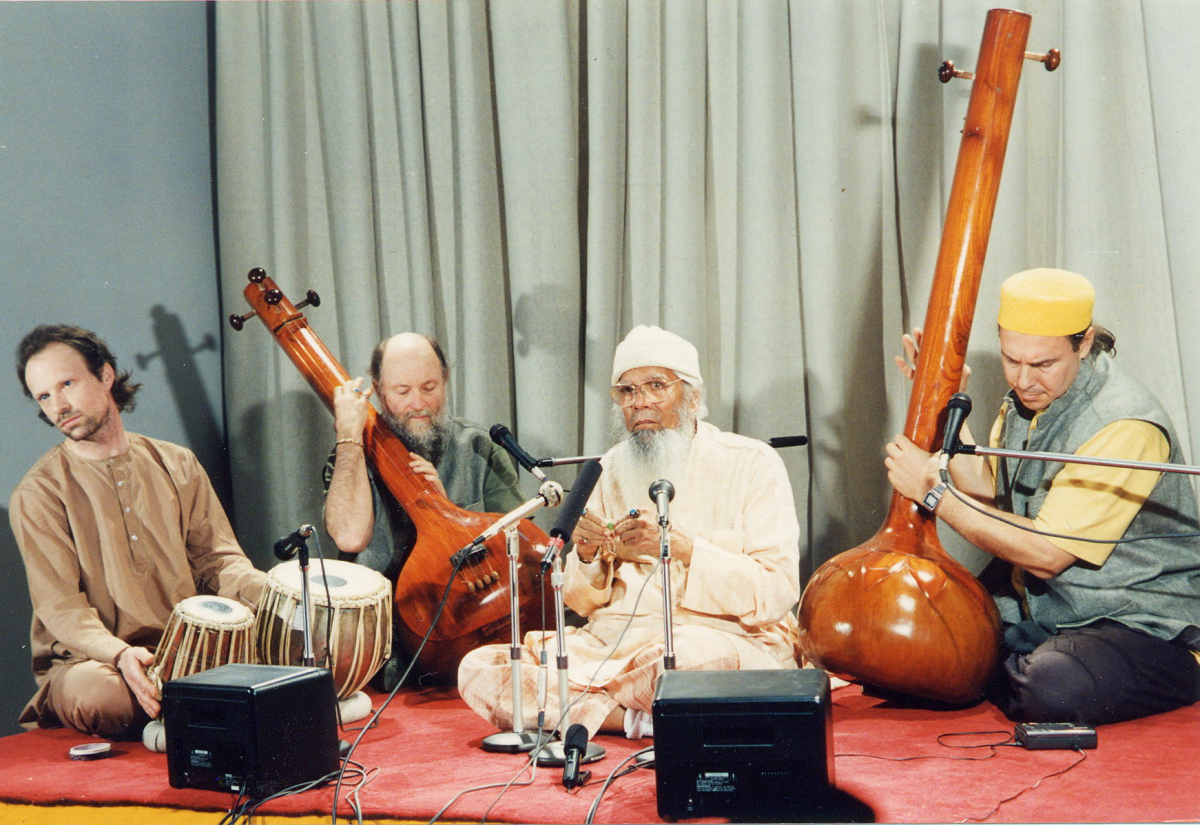 Pandit Pran Nath performing at Indira Gandhi National Center of Art and Culture (recording for the archive there), Delhi, with Rik Masterson, Terry Riley and Shabda Kahn (left to right). February, 1994. 